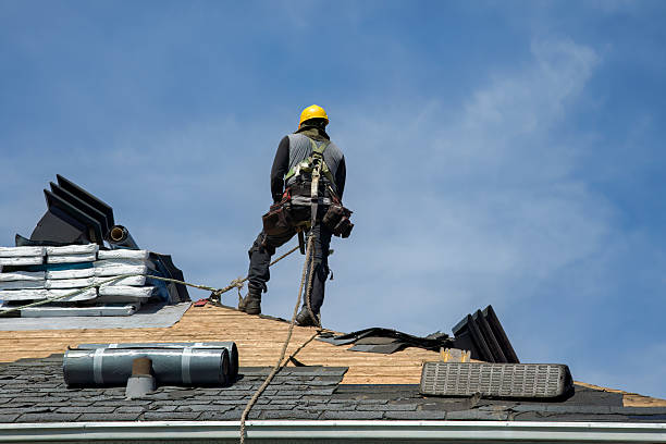 Professional Roof Replacement technician working in Sherrill, NY